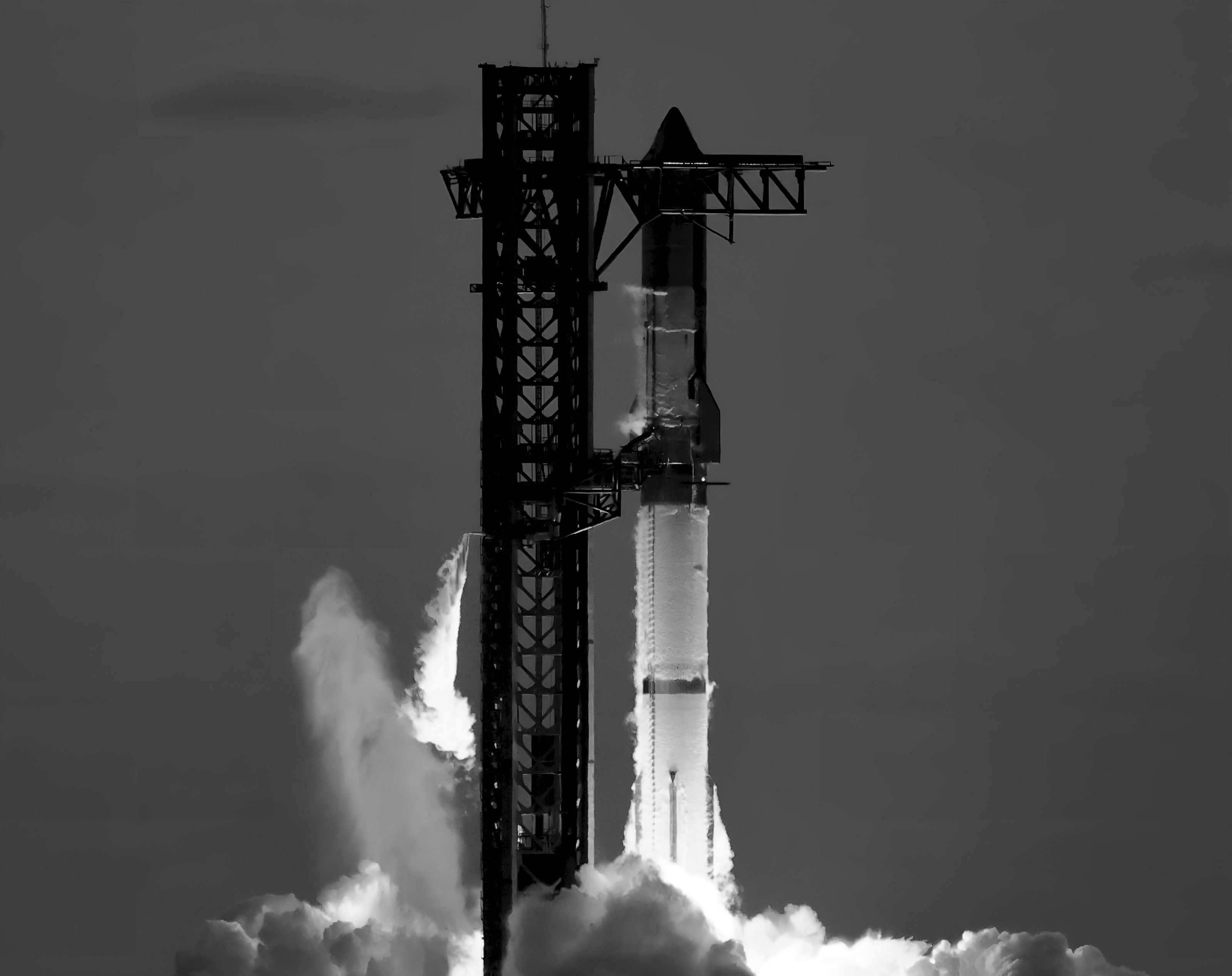 Starship lifting off the pad at Starbase
